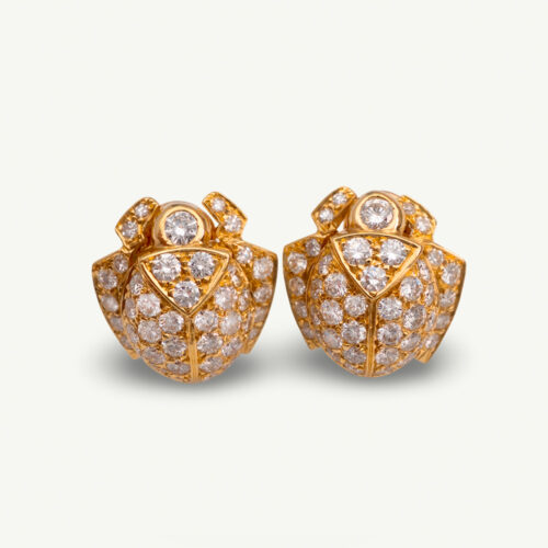 Diamond Scarab Earrings in 18K Yellow Gold Sculptural 18K yellow gold scarab earrings set with diamonds, featuring a domed beetle design with geometric detailing and high-jewelry finish.