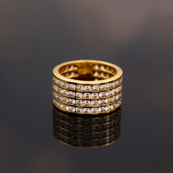 Four-Row Diamond Alliance Ring in 18K Yellow Gold 18K yellow gold four-row diamond alliance ring with round diamonds in a wide polished band.