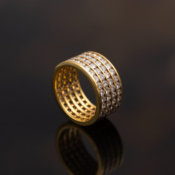 Four-Row Diamond Alliance Ring in 18K Yellow Gold 18K yellow gold four-row diamond alliance ring with round diamonds in a wide polished band.