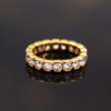 Hexagon Diamond Eternity Ring in 18K Yellow Gold 18K yellow gold eternity ring with round brilliant-cut diamonds in hexagonal gold settings.