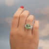 Green Tourmaline Blossom Ring in 18K White Gold 18K white gold ring with a cushion-shaped green tourmaline surrounded by pear-shaped and brilliant-cut diamonds in a floral-inspired setting.