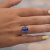 Natural Unheated Ceylon Sapphire Cabochon Ring in 18K White Gold Natural unheated Sri Lankan Ceylon blue sapphire cabochon ring in 18K white gold with diamond-set shoulders.