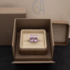 Amethyst Flower Ring in 18K White Gold 18K white gold flower ring with four amethyst cabochons and a diamond centre.