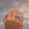 Natural Unheated Ceylon Cornflower Blue Sapphire Halo Ring in 18K White Gold Certified natural unheated cornflower blue Ceylon sapphire halo ring with diamonds in 18K white gold.