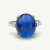 Natural Unheated Ceylon Sapphire Cabochon Ring in 18K White Gold Natural unheated Sri Lankan Ceylon blue sapphire cabochon ring in 18K white gold with diamond-set shoulders.
