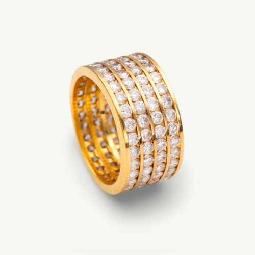 Four-Row Diamond Alliance Ring in 18K Yellow Gold 18K yellow gold four-row diamond alliance ring with round diamonds in a wide polished band.